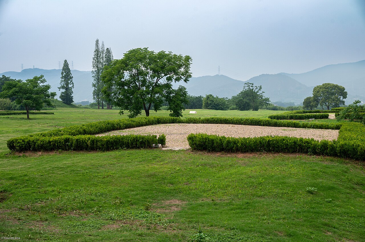 Low presented archaeological landscape, vegetation and hills at Liangzhu City