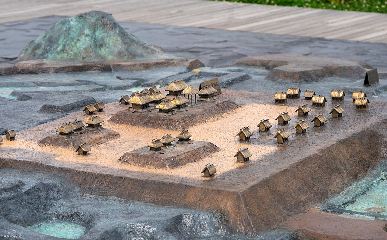 Modern three-dimensional interpretive model of Liangzhu with miniature buildings and raised ground